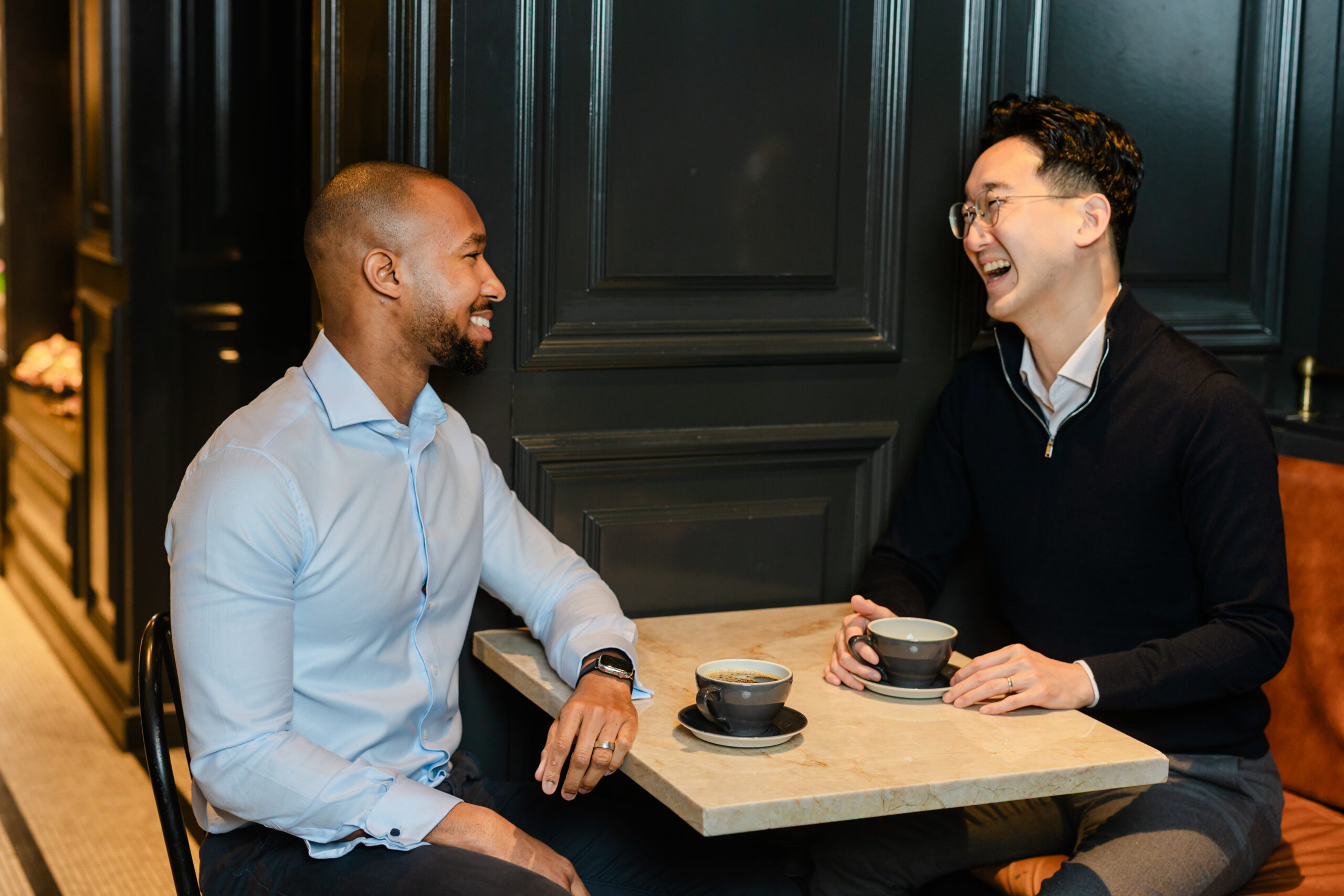 two co workers sharing coffee in the adolphus hotel 