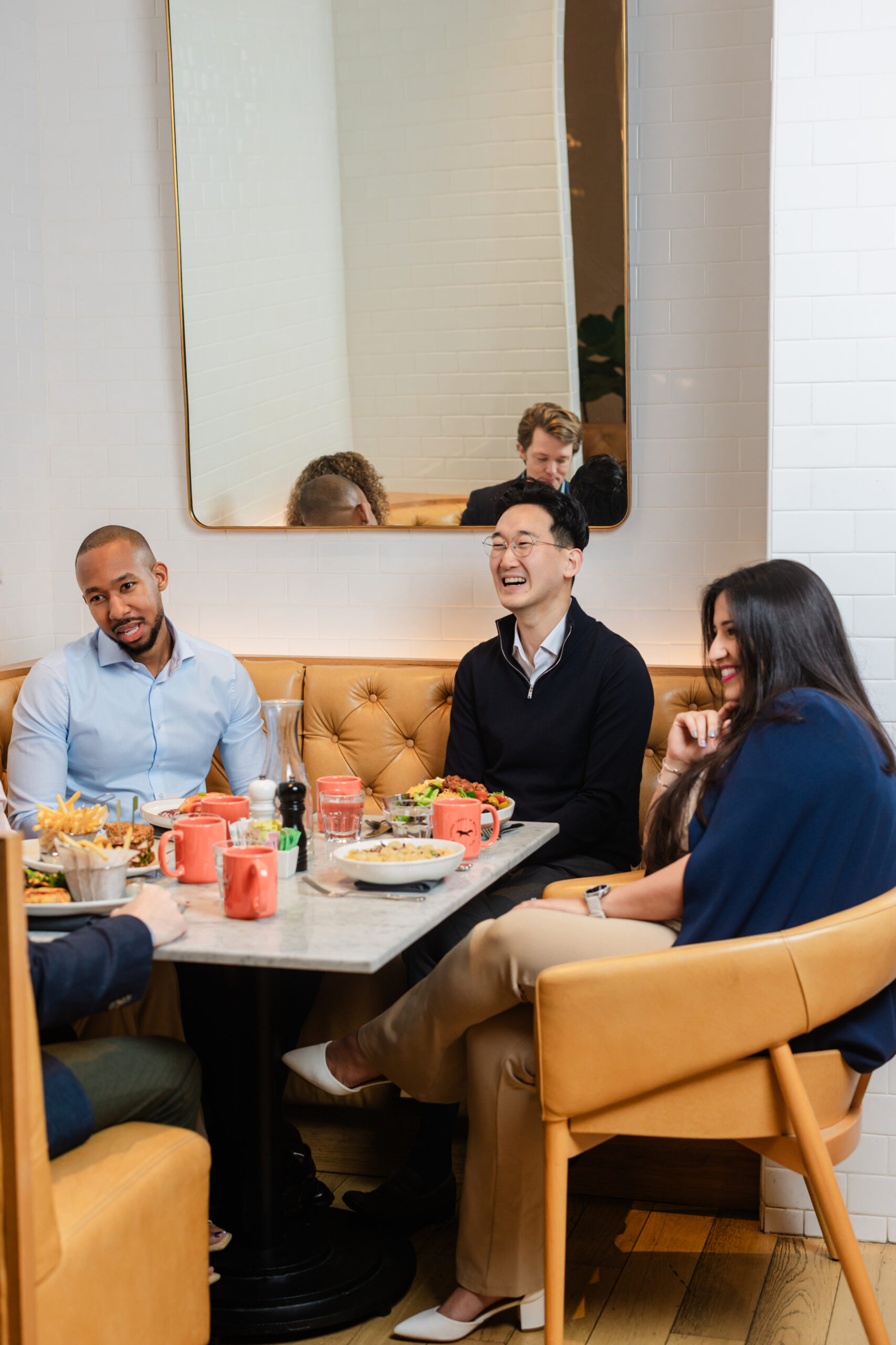 a group of co workers enjoying breakfast in the adolphus hotel 