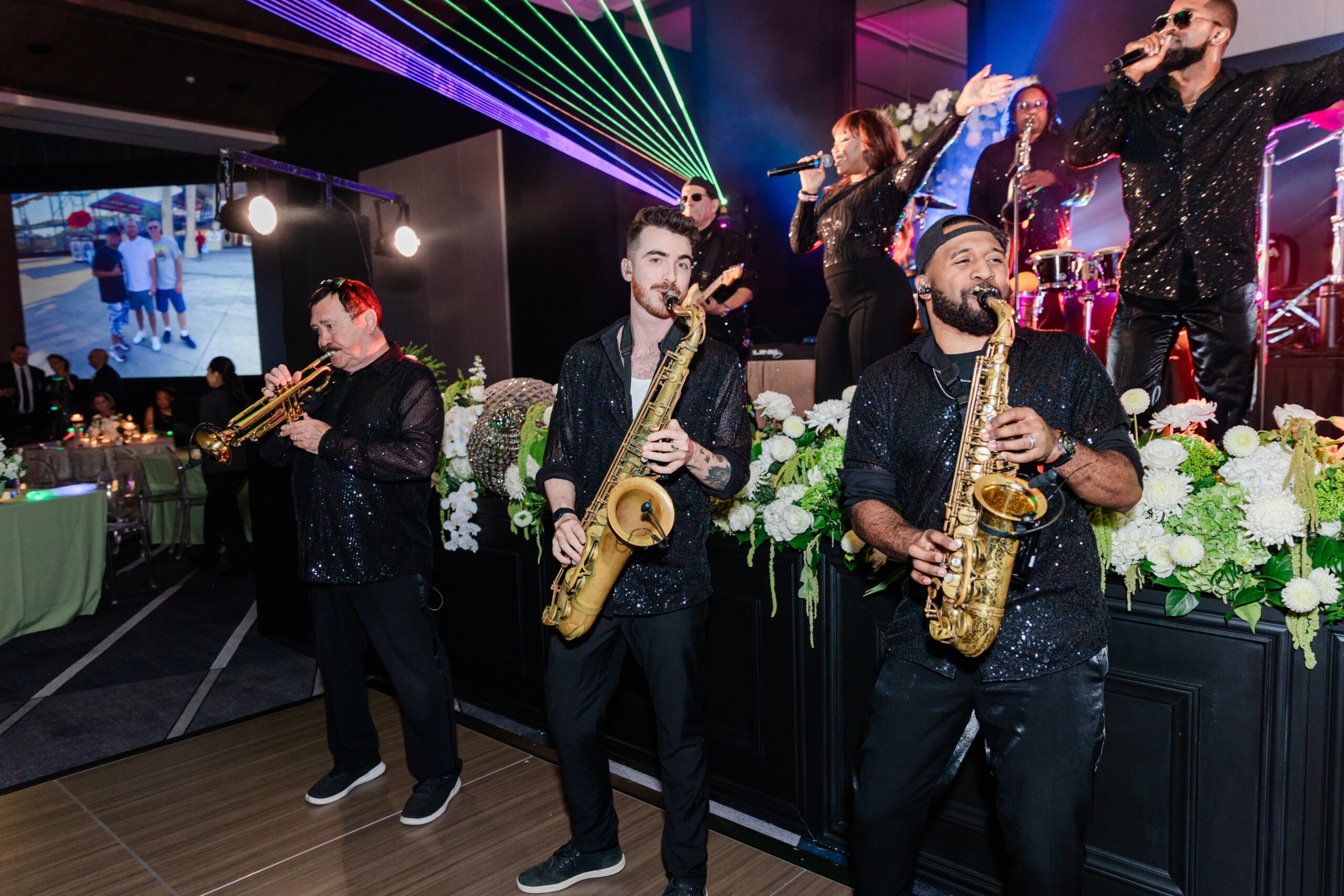 a band playing at a corporate event at the jw marriott dallas on the dance floor