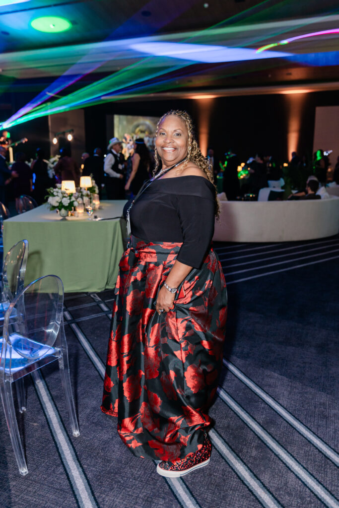 a woman on the dance floor at a corporate event