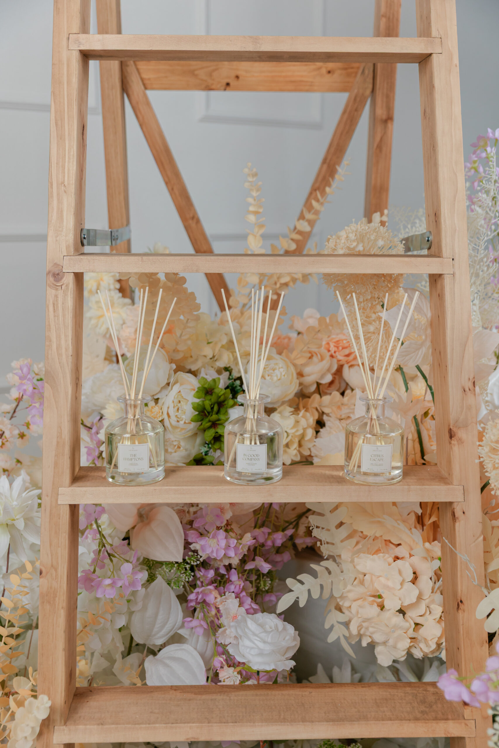 diffusers from Life In Lilac on display on a ladder 