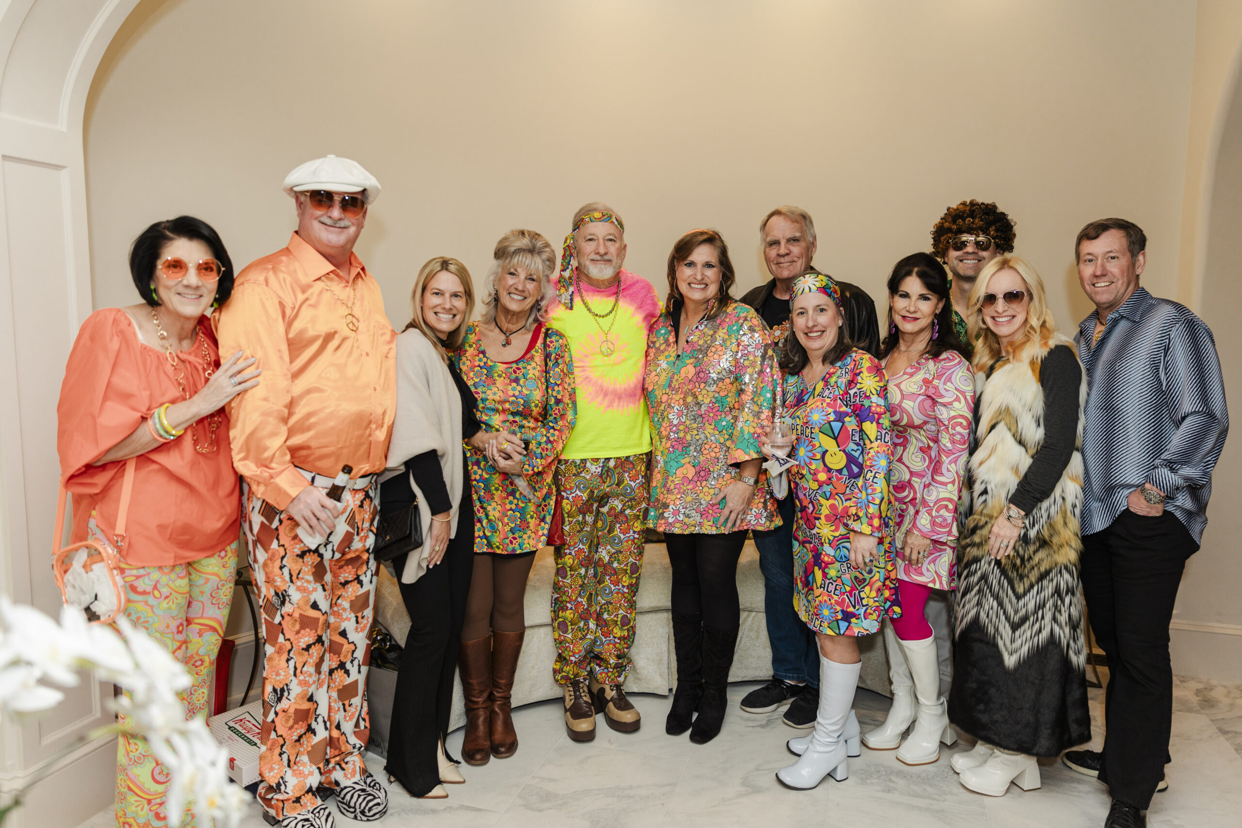 a group taking photos for a birthday party