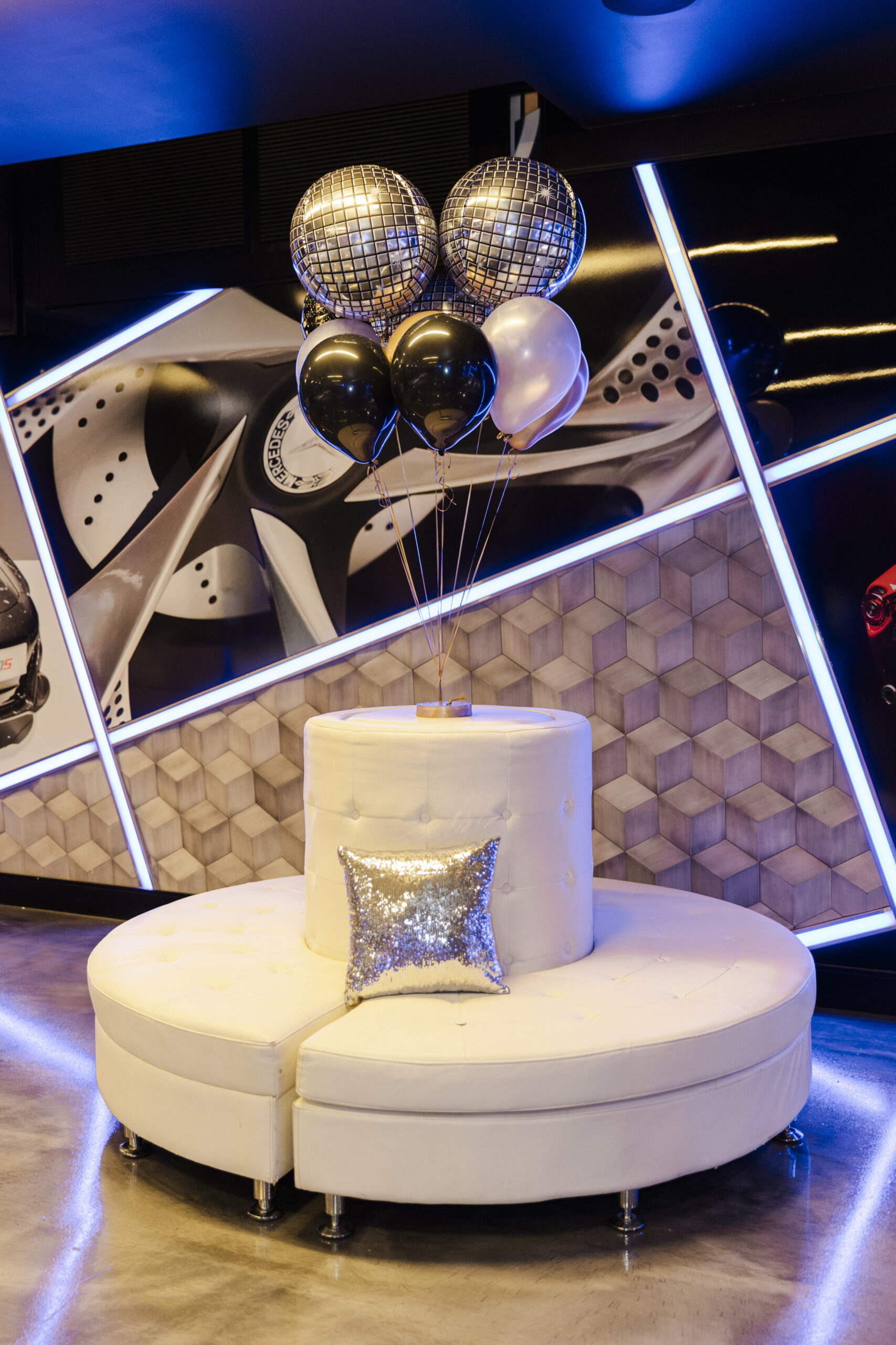 a ciricular seat decorated with balloons